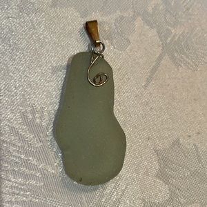 Handcrafted pendant in sea glass with blue/green hue